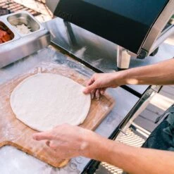 Ooni Karu 16 Inch Portable Wood And Charcoal Fired Outdoor Pizza Oven Startup Bundle -Joes BBQs Store Ooni Karu 16 in use d 1024x1024 2x 219962bd 70d8 4576 8b4a 684f9e4f3d84