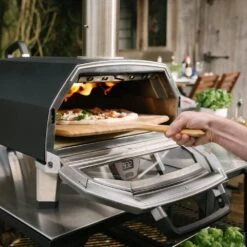 Ooni Karu 16 Inch Portable Wood Charcoal Outdoor Pizza Oven - Pro Bundle -Joes BBQs Store Ooni Karu 16 in use h 1024x1024 2x 5f55c346 4f72 4b63 b550 0134b7ebbb5f