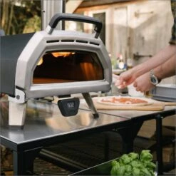 Ooni Karu 16 Inch Portable Wood Charcoal Outdoor Pizza Oven - Pro Bundle -Joes BBQs Store Ooni Karu 16 in use j 1024x1024 2x 7dc19085 9a65 47b2 8bae d2918d76d3e0