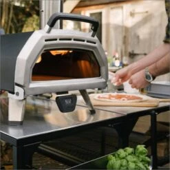 Ooni Karu 16 Inch Portable Wood And Charcoal Fired Outdoor Pizza Oven Loaded Bundle -Joes BBQs Store Ooni Karu 16 in use j 1024x1024 2x aa2e7ae6 fa47 4366 a966 d5963dc9b3d4 1