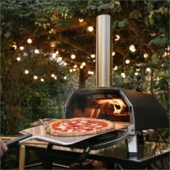 Ooni Karu 16 Inch Portable Wood And Charcoal Fired Outdoor Pizza Oven Loaded Bundle -Joes BBQs Store Ooni Karu 16 in use l 1024x1024 2x 31f3295d 3663 43a9 a939 06731ef67e21 1